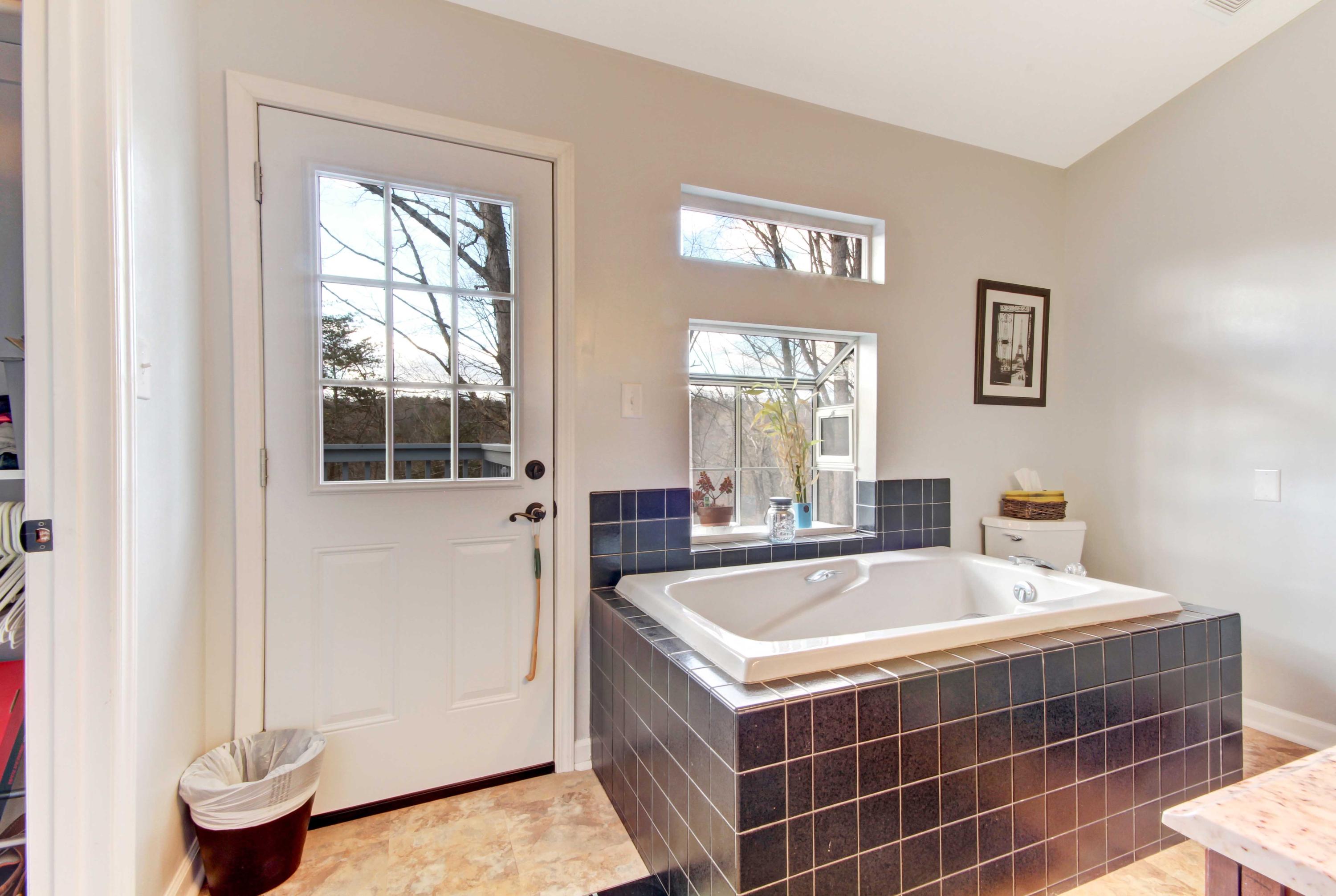 3355 Turner Branch Road Vinton, VA 24179 - Photo 15 of 58 a bathroom with a tub and a sink