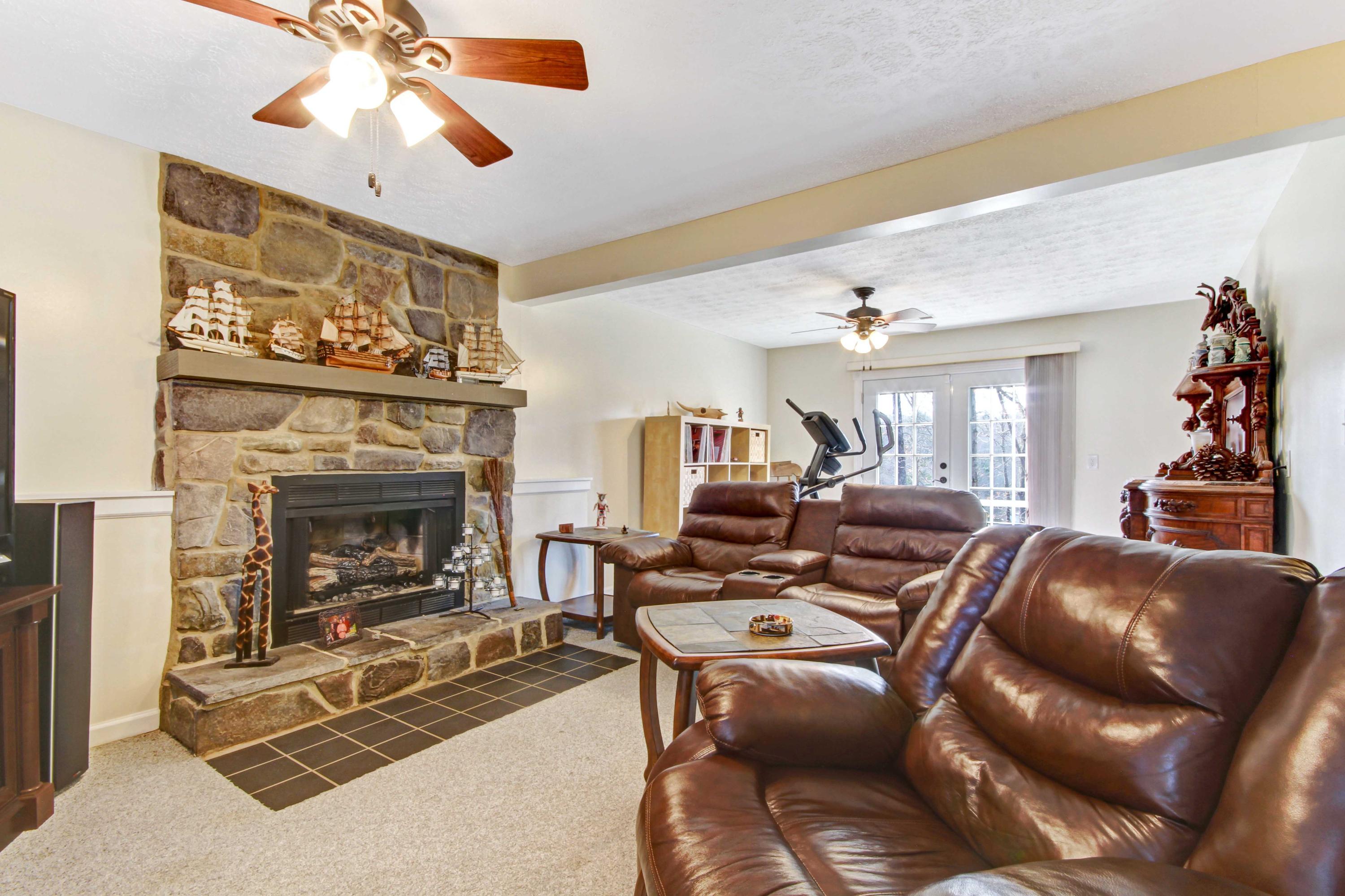 3355 Turner Branch Road Vinton, VA 24179 - Photo 23 of 58 a living room with furniture and a fireplace