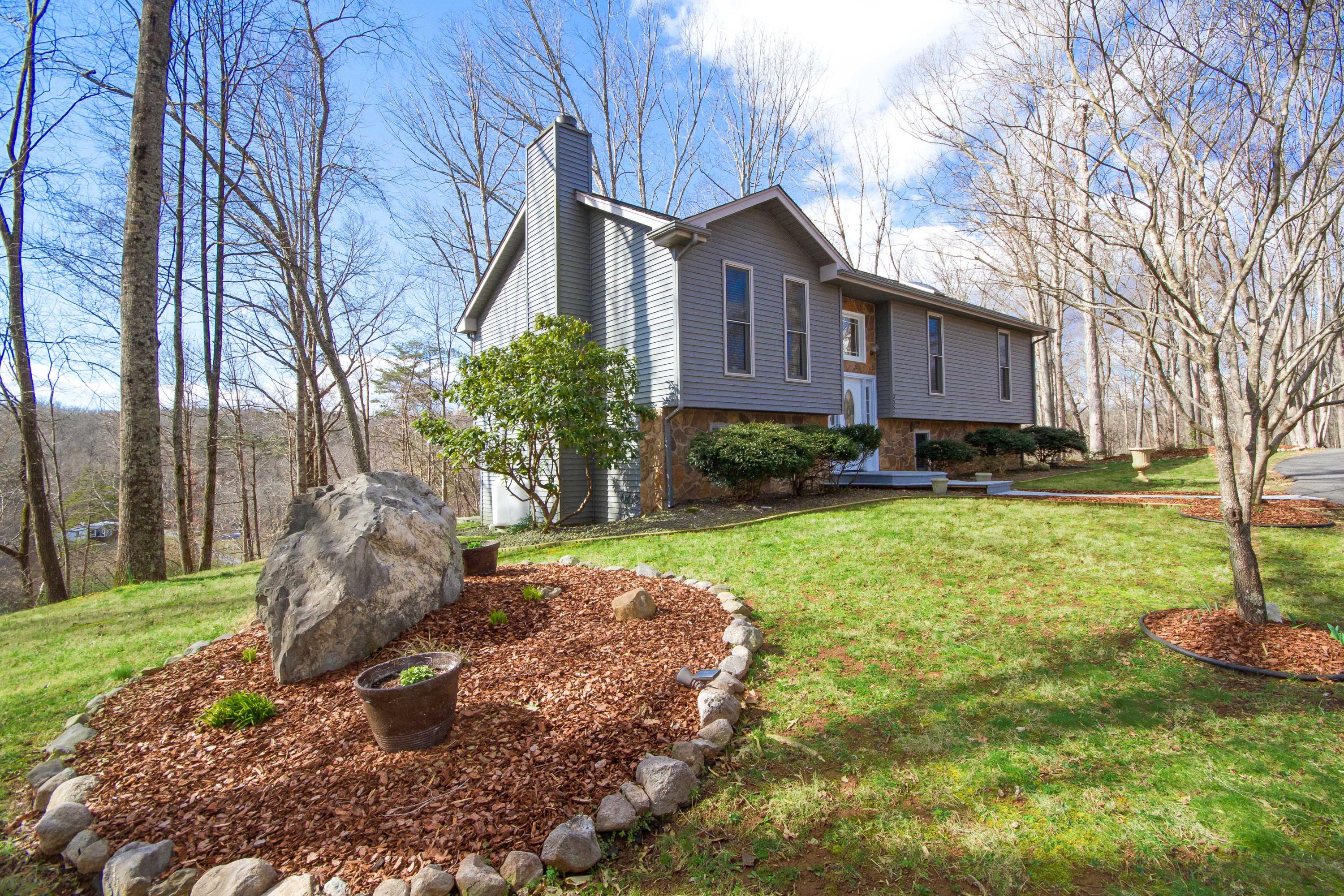 3355 Turner Branch Road Vinton, VA 24179 - Photo 30 of 58 a front view of a house with garden