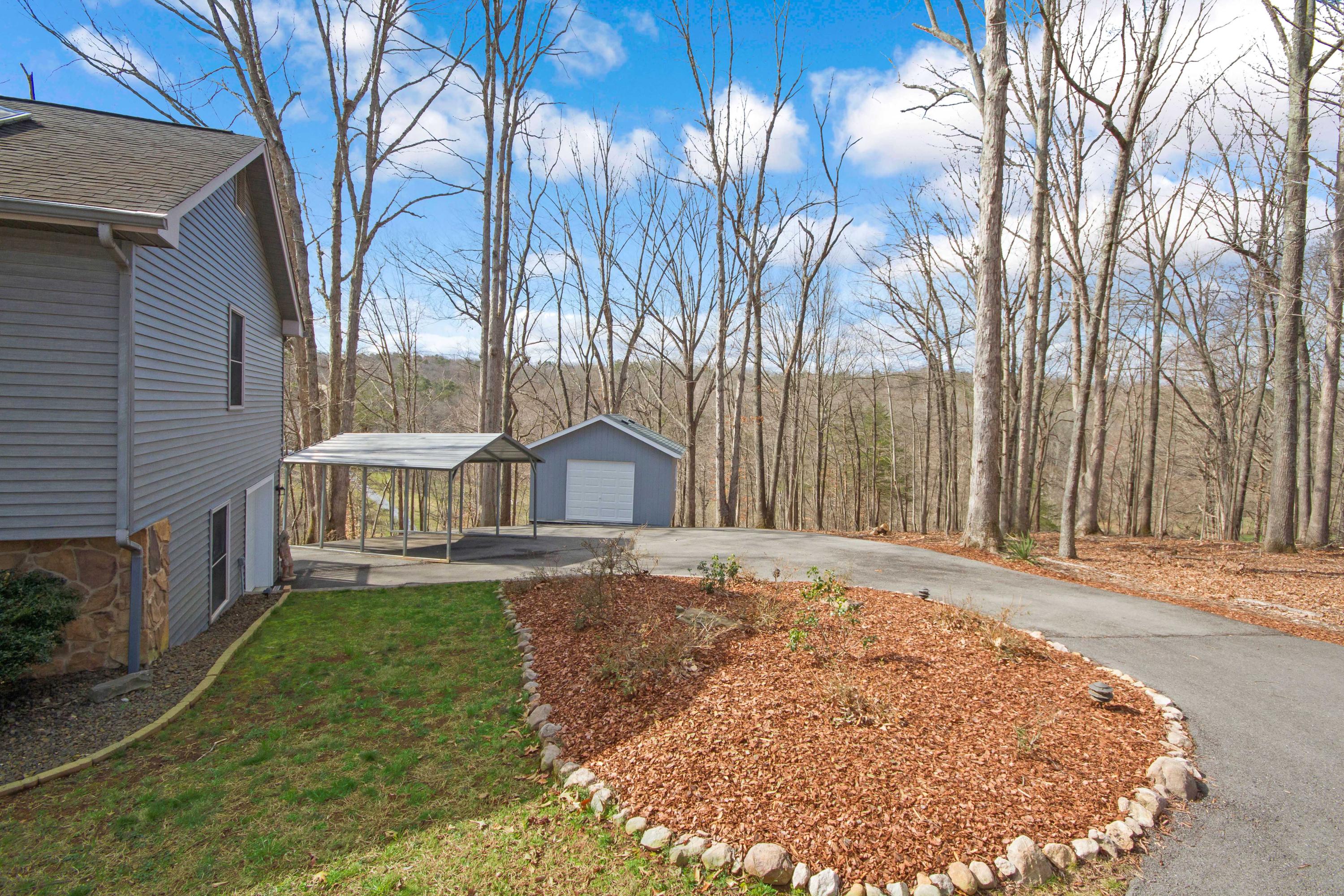 3355 Turner Branch Road Vinton, VA 24179 - Photo 31 of 58 a front view of a house with a yard and garage