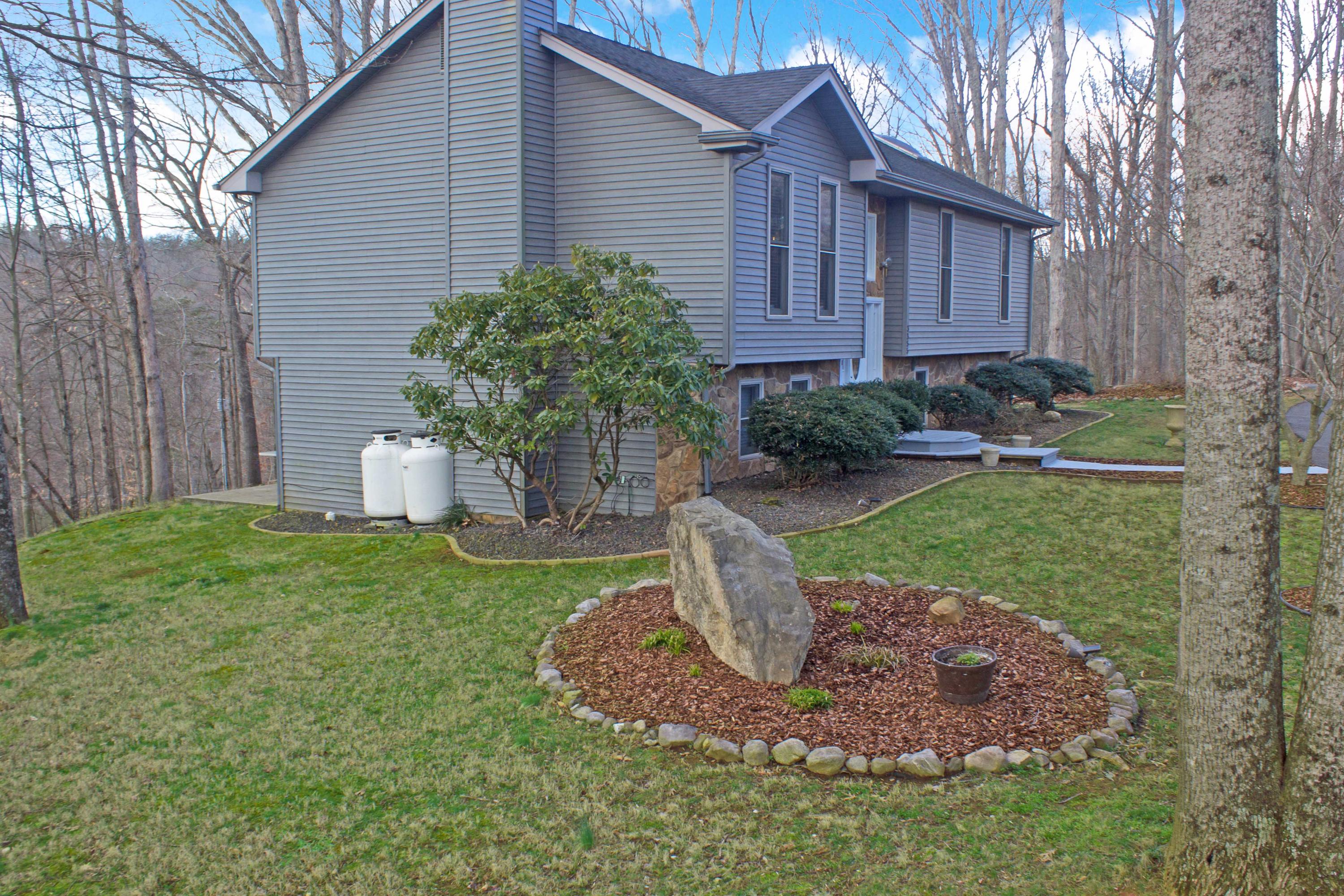 3355 Turner Branch Road Vinton, VA 24179 - Photo 44 of 58 a front view of a house with a garden