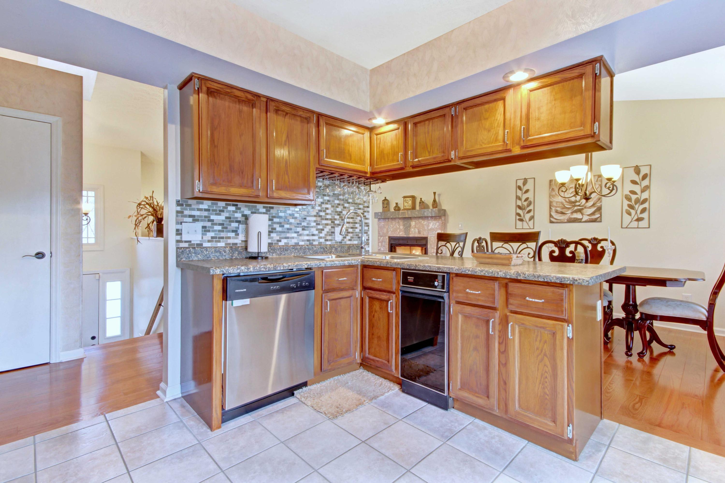 3355 Turner Branch Road Vinton, VA 24179 - Photo 8 of 58 a kitchen with stainless steel appliances granite countertop a stove and cabinets