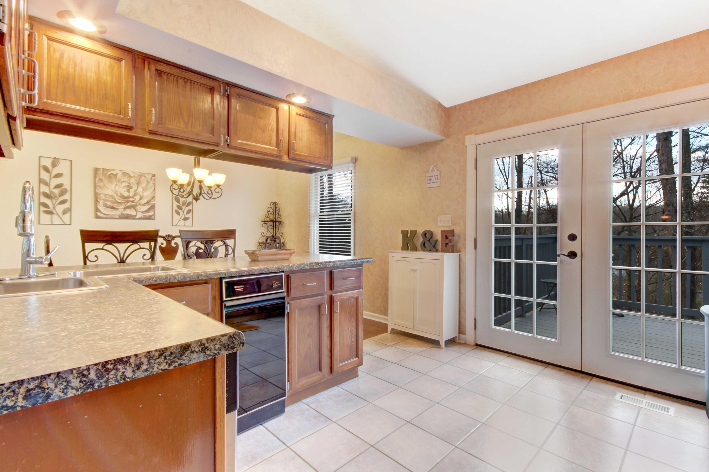 3355 Turner Branch Road Vinton, VA 24179 - Photo 9 of 58 a view of a kitchen with granite countertop a stove top oven