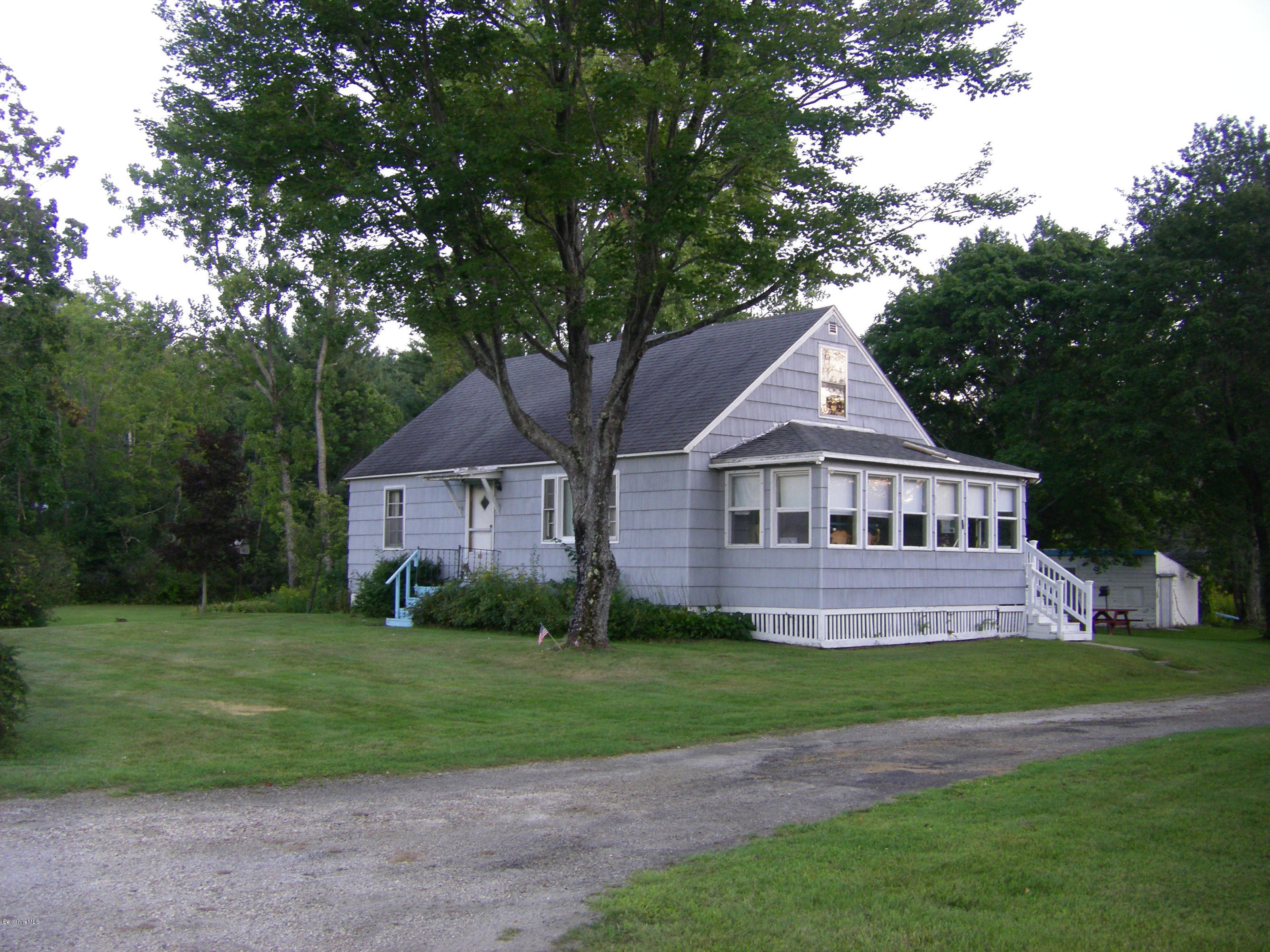 401 Cross Road Clarksburg, MA 01247 - Photo 3 of 26 a front view of house with yard and green space