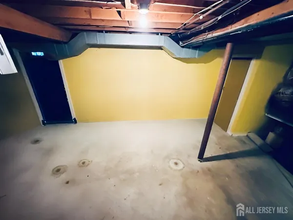 a view of a room with painted walls