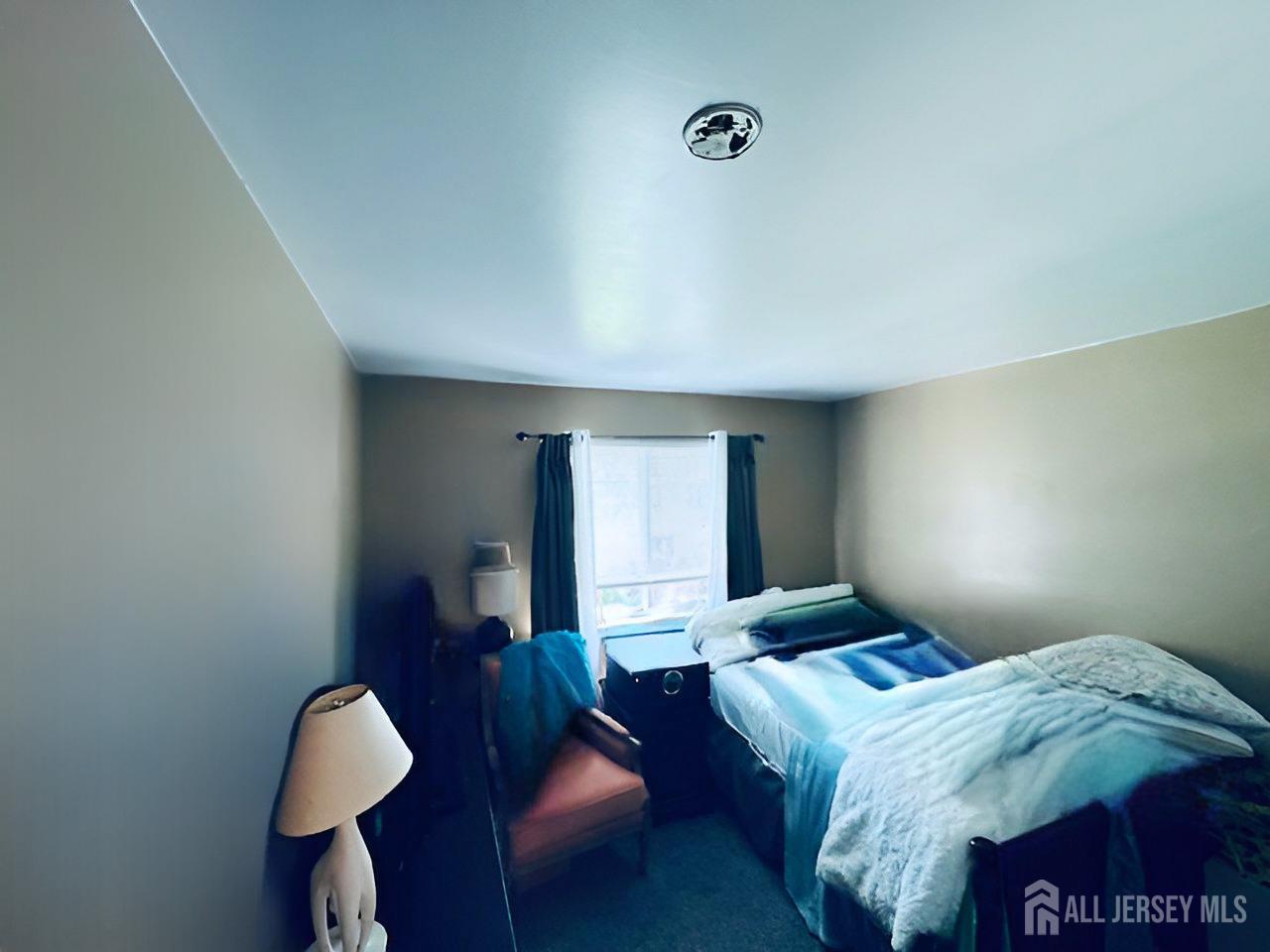 2 Devonshire Court Ewing, NJ 08628 - Photo 23 of 25 a bedroom with a bed and a window