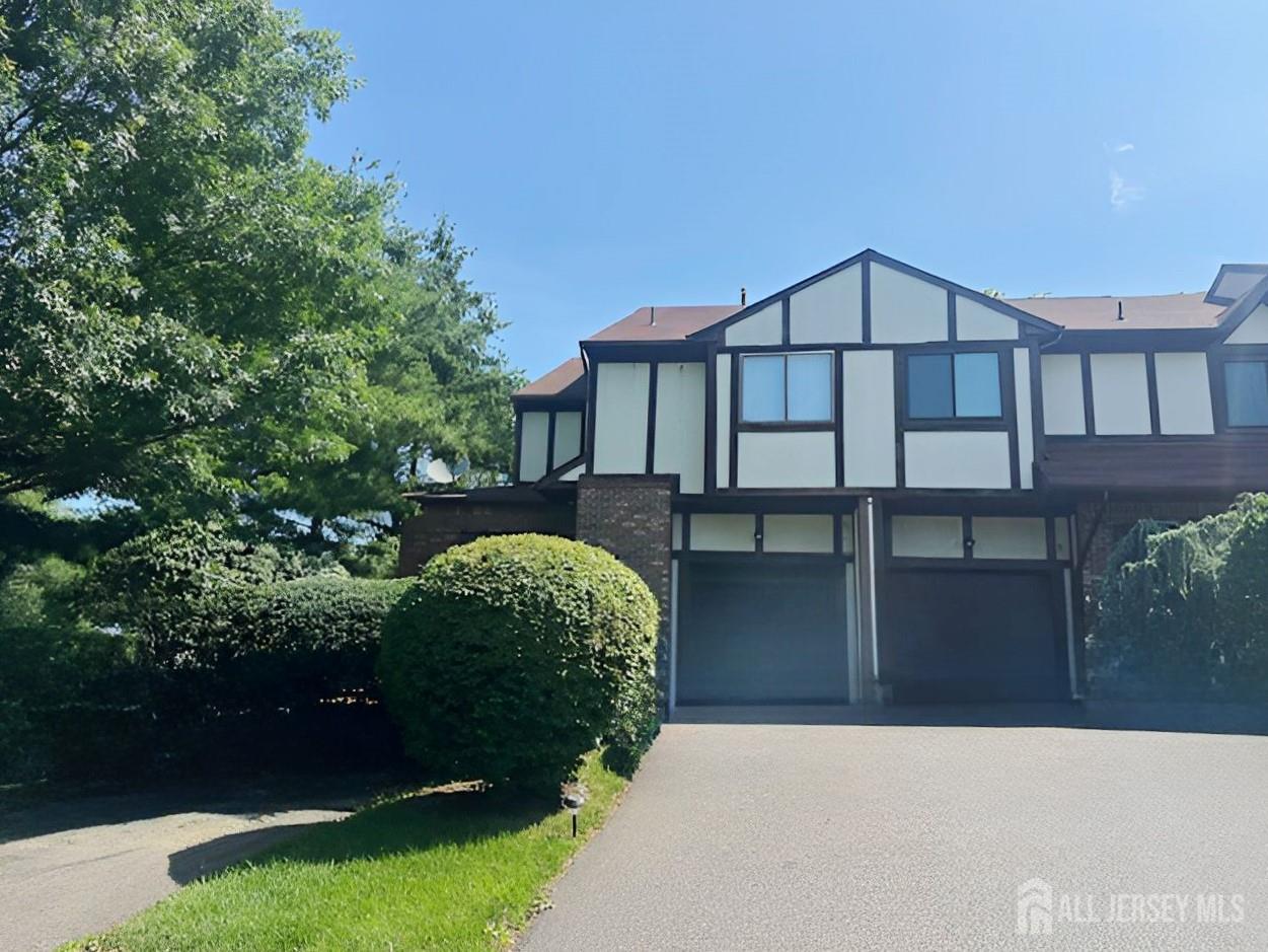 2 Devonshire Court Ewing, NJ 08628 - Photo 25 of 25 a front view of a house with garden