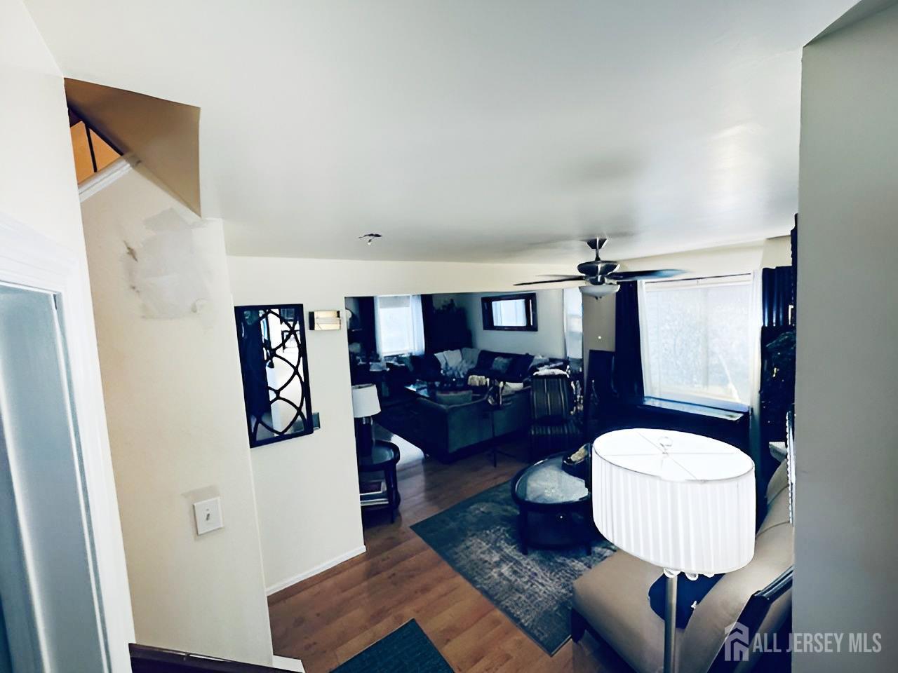 2 Devonshire Court Ewing, NJ 08628 - Photo 6 of 25 a living room with furniture and a mirror