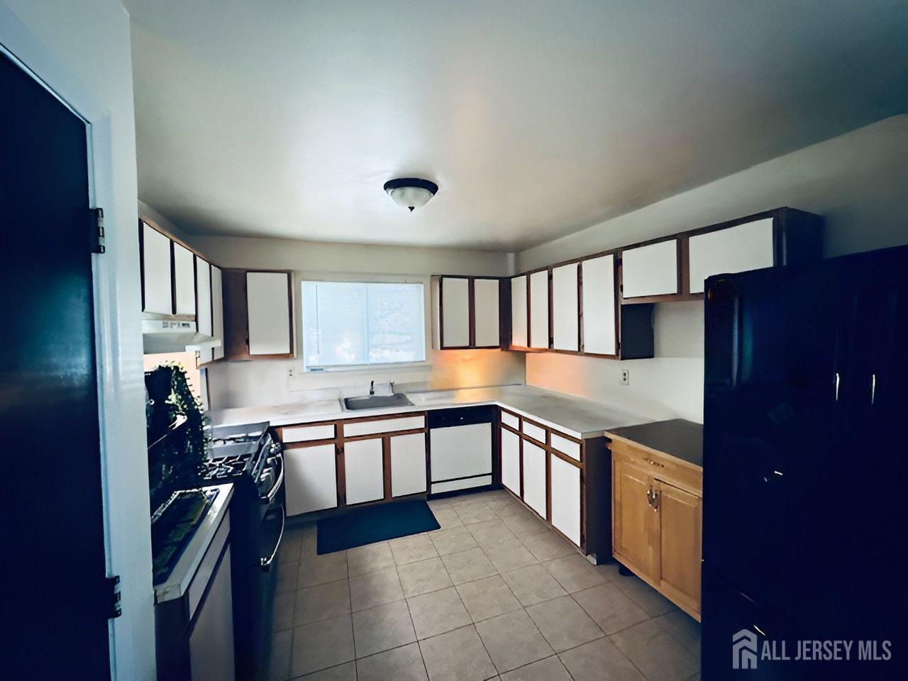 2 Devonshire Court Ewing, NJ 08628 - Photo 10 of 25 a kitchen with stainless steel appliances granite countertop a sink and stove