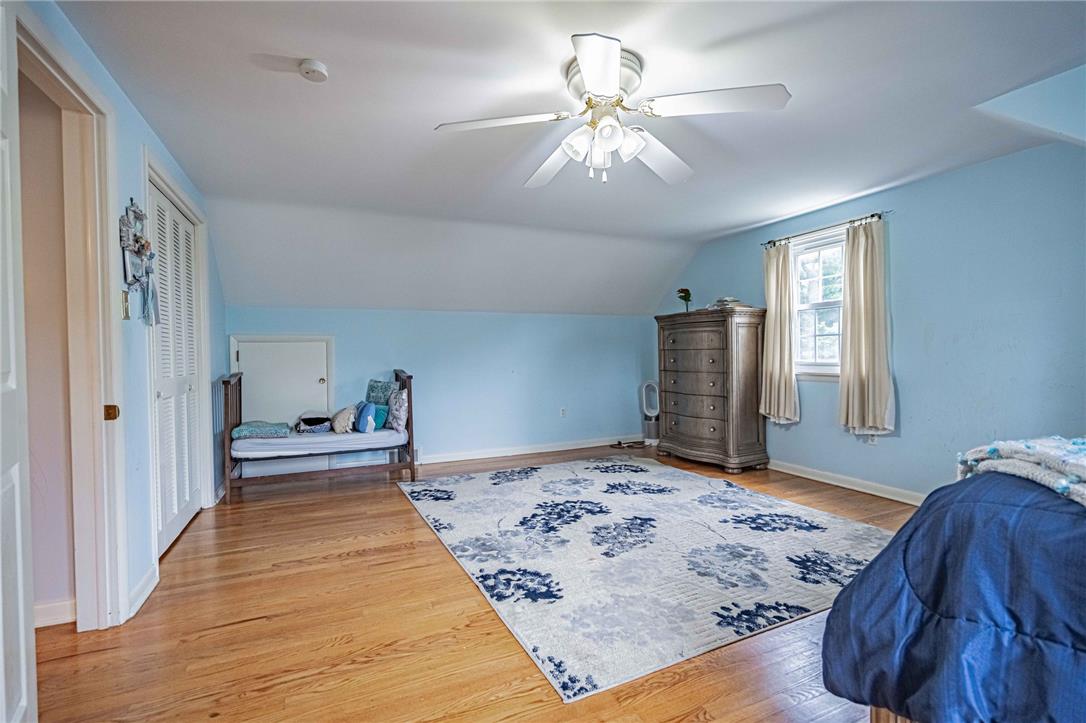 285 Bridle Path Road Bethlehem, PA 18017 - Photo 32 of 54 a bedroom with a large bed and a chandelier
