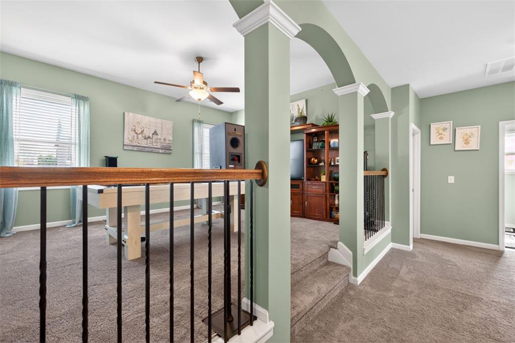 4479 Big Rock Rdg Trail Gainesville, GA 30504 - Photo 16 of 45 a view of a hallway view with staircase and kitchen view