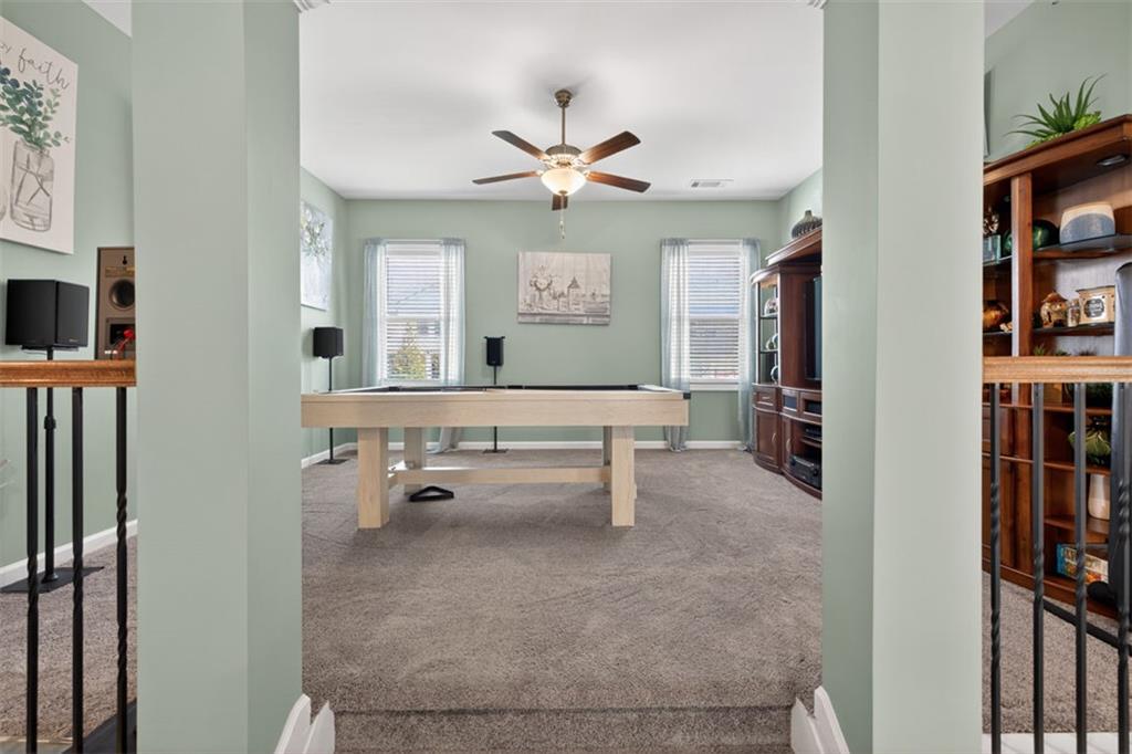 4479 Big Rock Rdg Trail Gainesville, GA 30504 - Photo 19 of 45 a dining room with furniture and a window