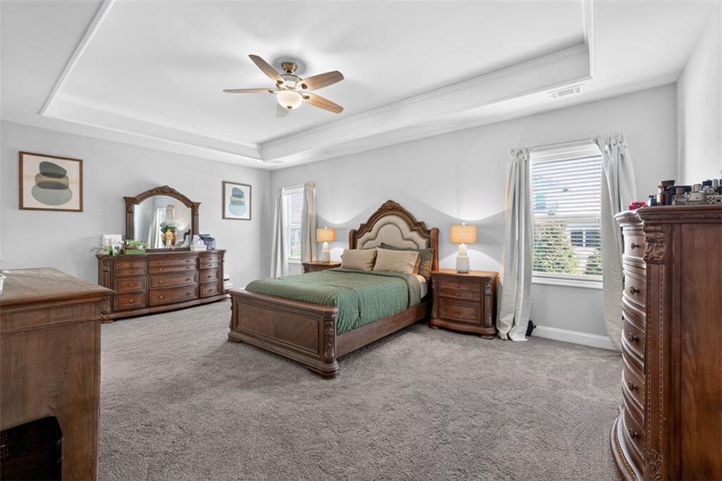 4479 Big Rock Rdg Trail Gainesville, GA 30504 - Photo 20 of 45 a bedroom with a bed dresser and a window