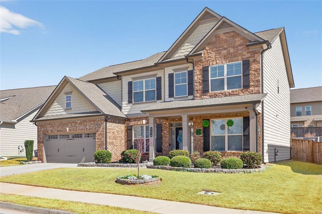 4479 Big Rock Rdg Trail Gainesville, GA 30504 - Photo 2 of 45 a front view of a house with a yard