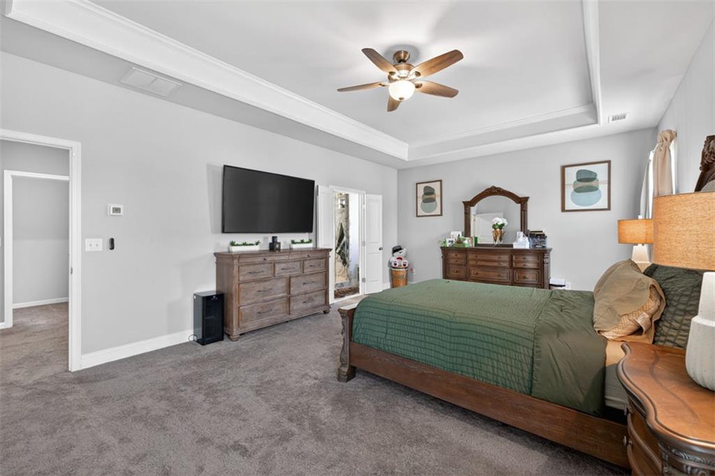 4479 Big Rock Rdg Trail Gainesville, GA 30504 - Photo 21 of 45 a bedroom with a bed and a flat screen tv