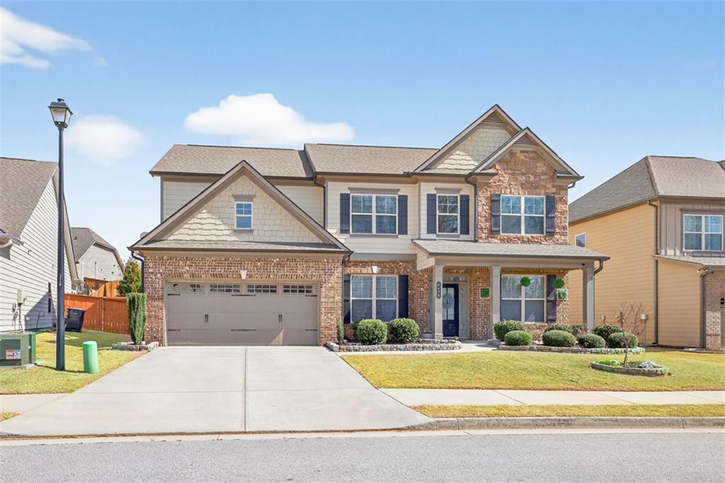 4479 Big Rock Rdg Trail Gainesville, GA 30504 - Photo 3 of 45 a front view of a house with a yard