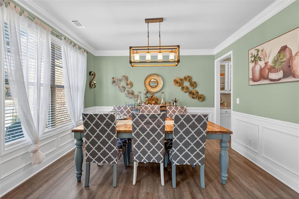 4479 Big Rock Rdg Trail Gainesville, GA 30504 - Photo 6 of 45 a view of a dining room with furniture and wooden floor