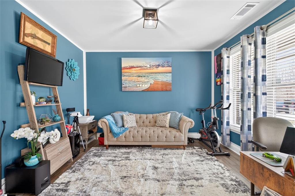 4479 Big Rock Rdg Trail Gainesville, GA 30504 - Photo 7 of 45 a living room with furniture and a flat screen tv