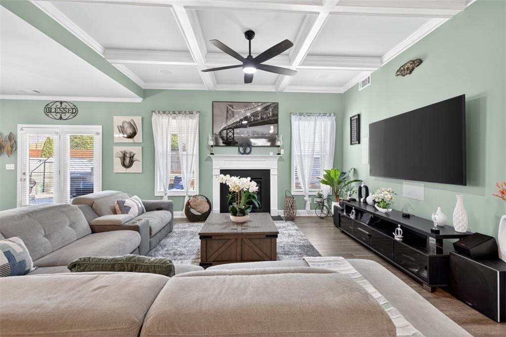 4479 Big Rock Rdg Trail Gainesville, GA 30504 - Photo 9 of 45 a living room with furniture a fireplace and a flat screen tv