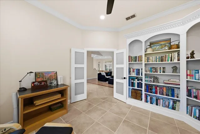 a front of a brick building with a sign broad