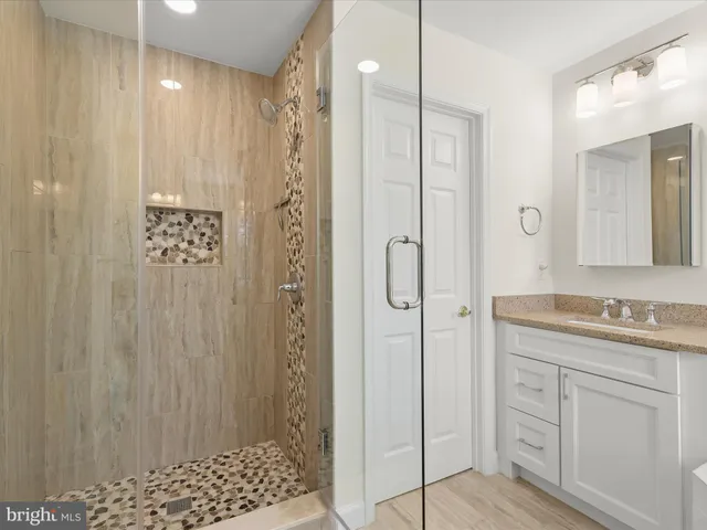 a view of a park with a large tree