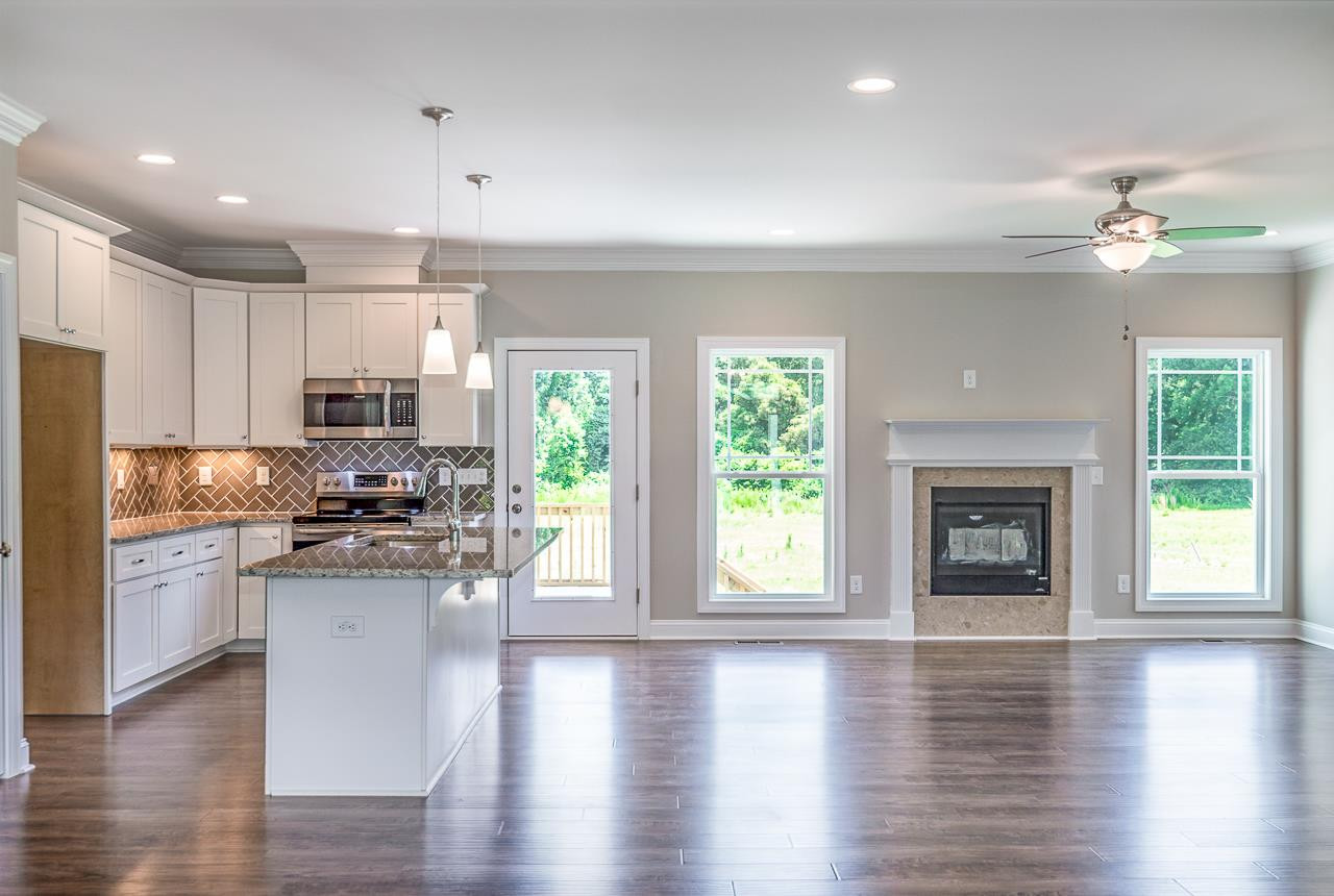 6733 Dwight Rowland Road Willow Spring, NC 27592 - Photo 24 of 25 Open and spacious floor plan great for gatherings kitchen and family view