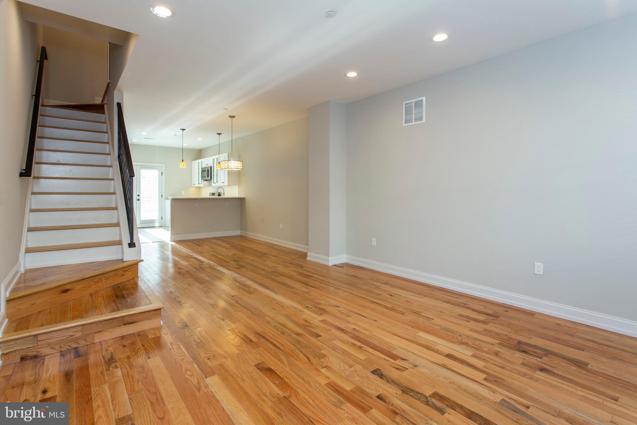 2052 Gerritt Street Philadelphia, PA 19146 - Photo 2 of 32 a view of a room with wooden floor and stairs
