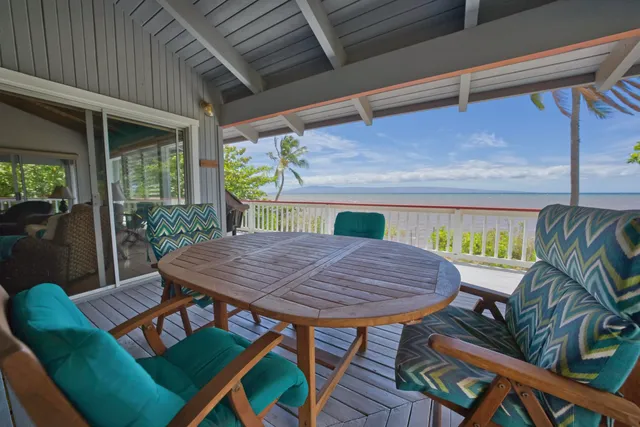 a view of deck with furniture and wooden floor