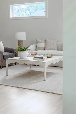 a living room with furniture and a couch