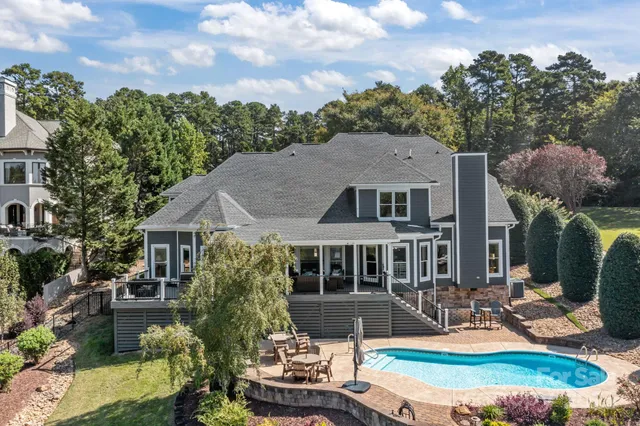 a front view of house with yard nad seating space