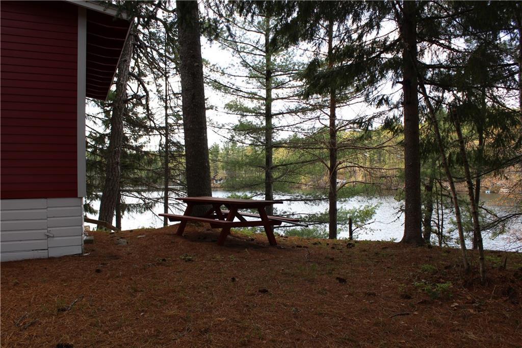 83 Kettle Pond Road, Unit 17 Shapleigh, ME 04076 - Photo 6 of 24 Picnic area with water views