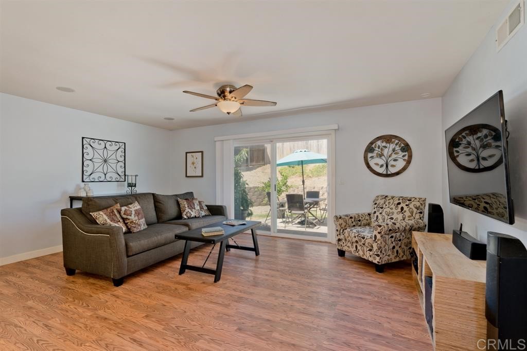 9456 Cathywood Drive Santee, CA 92071 - Photo 1 of 25 a living room with furniture and a large window
