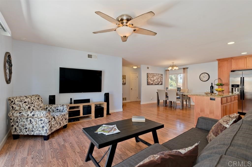 9456 Cathywood Drive Santee, CA 92071 - Photo 4 of 25 a living room with furniture and a flat screen tv