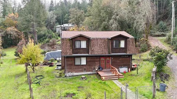 a aerial view of a house with swimming pool
