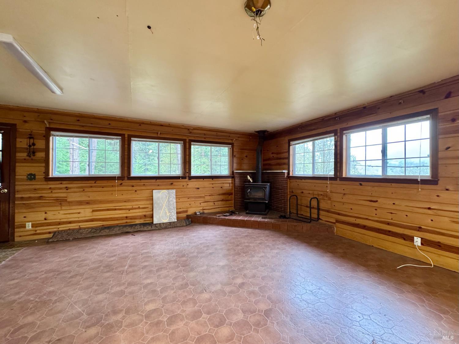 5083 Dry Creek Road Napa, CA 94558 - Photo 33 of 90 wooden floor in an empty room with a window