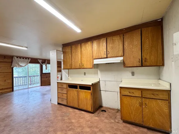 a view of a house with wooden floor