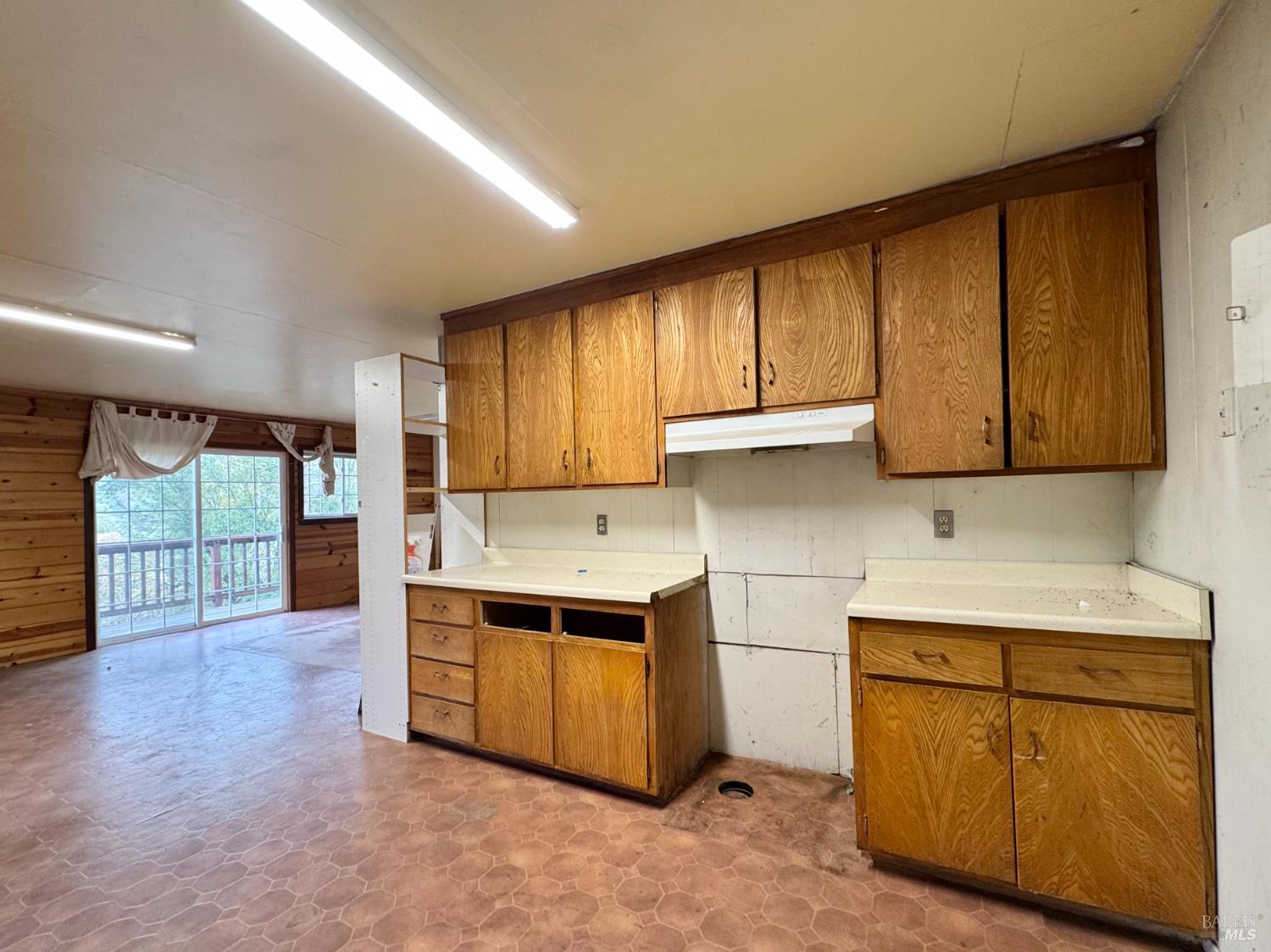 5083 Dry Creek Road Napa, CA 94558 - Photo 40 of 90 a kitchen with stainless steel appliances granite countertop a stove and a sink