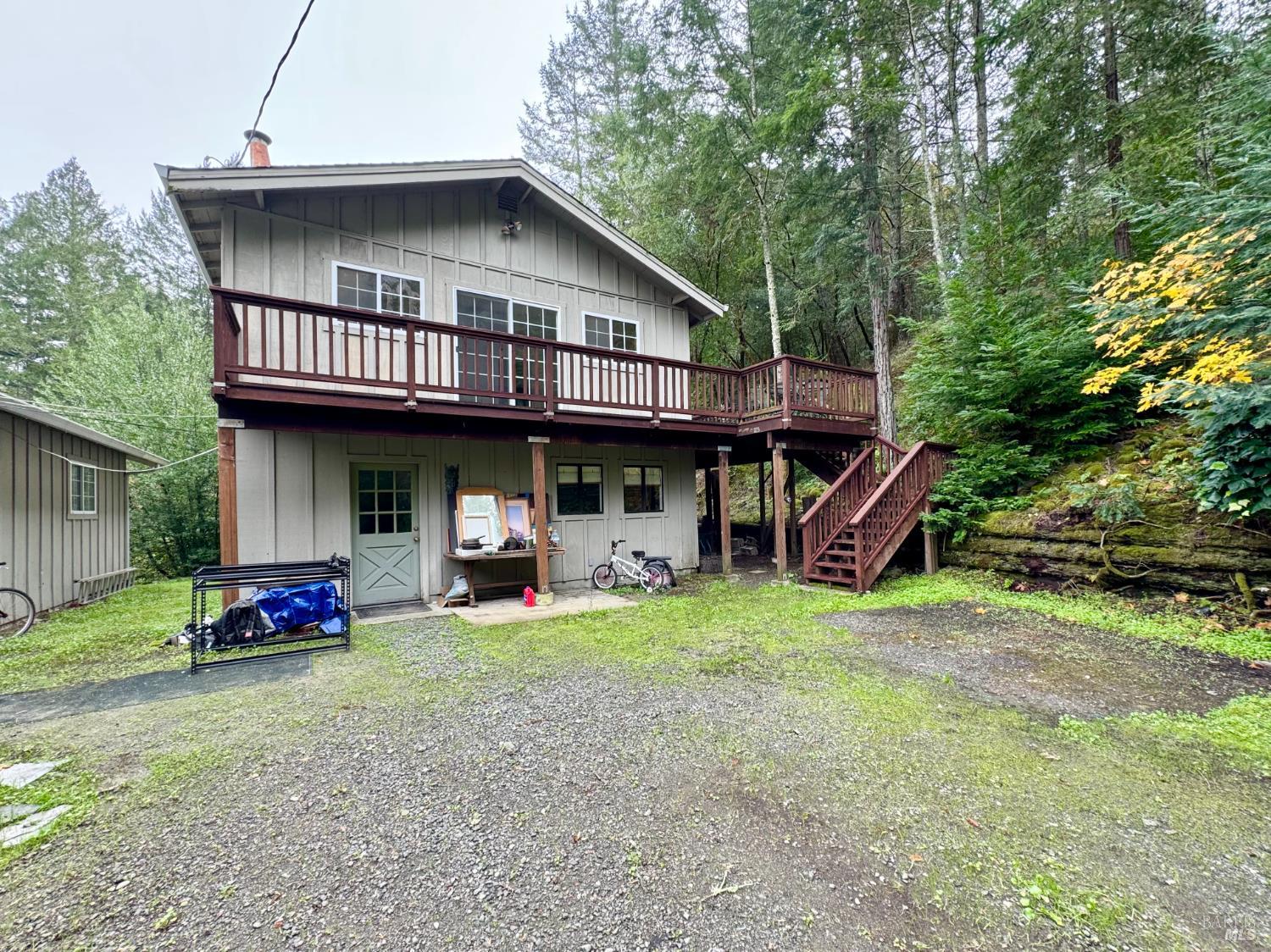 5083 Dry Creek Road Napa, CA 94558 - Photo 53 of 90 a view of a house with a yard and lawn chairs