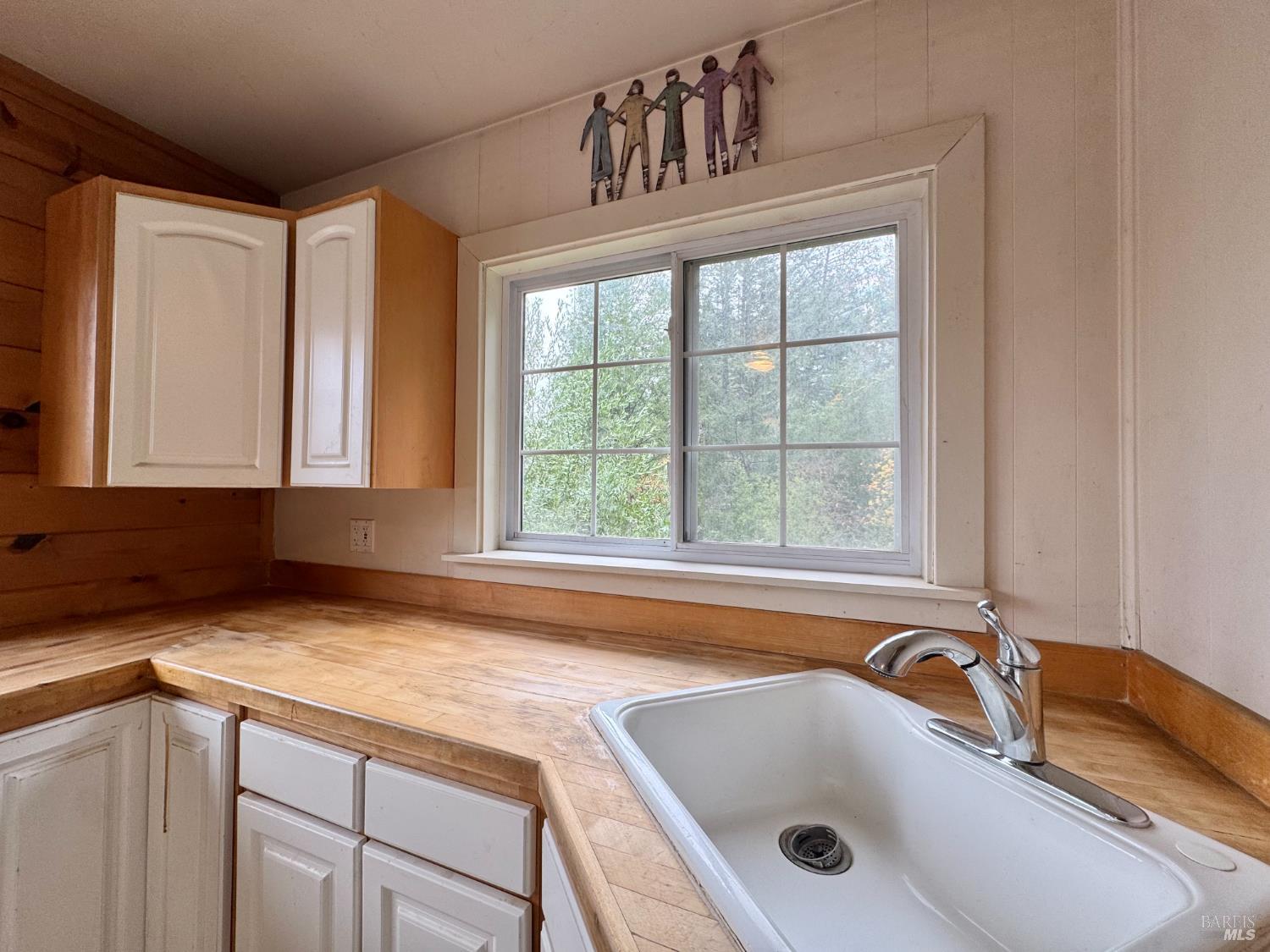 5083 Dry Creek Road Napa, CA 94558 - Photo 71 of 90 a bathroom with a granite countertop sink and mirror