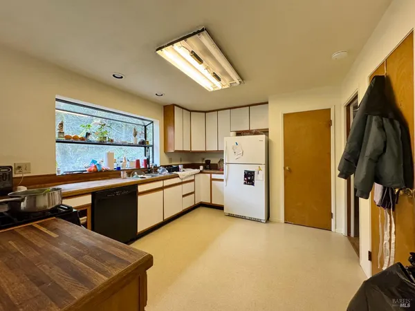 a bathroom with a shower and a toilet