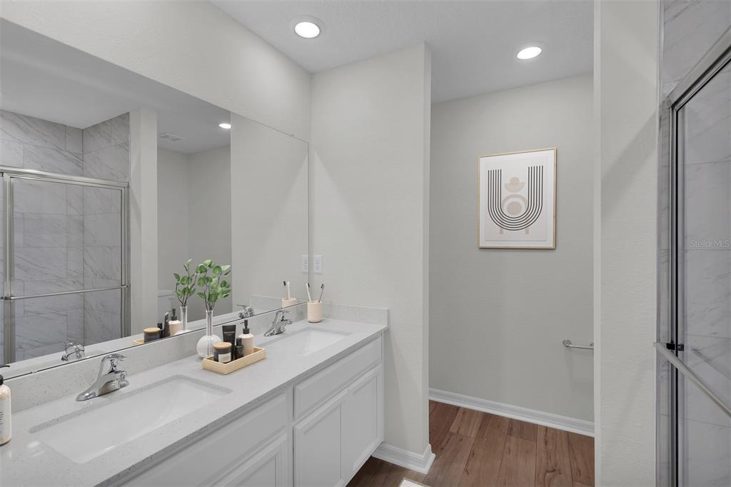 2 Prince Eric Lane Palm Coast, FL 32164 - Photo 18 of 20 a bathroom with a sink and a mirror