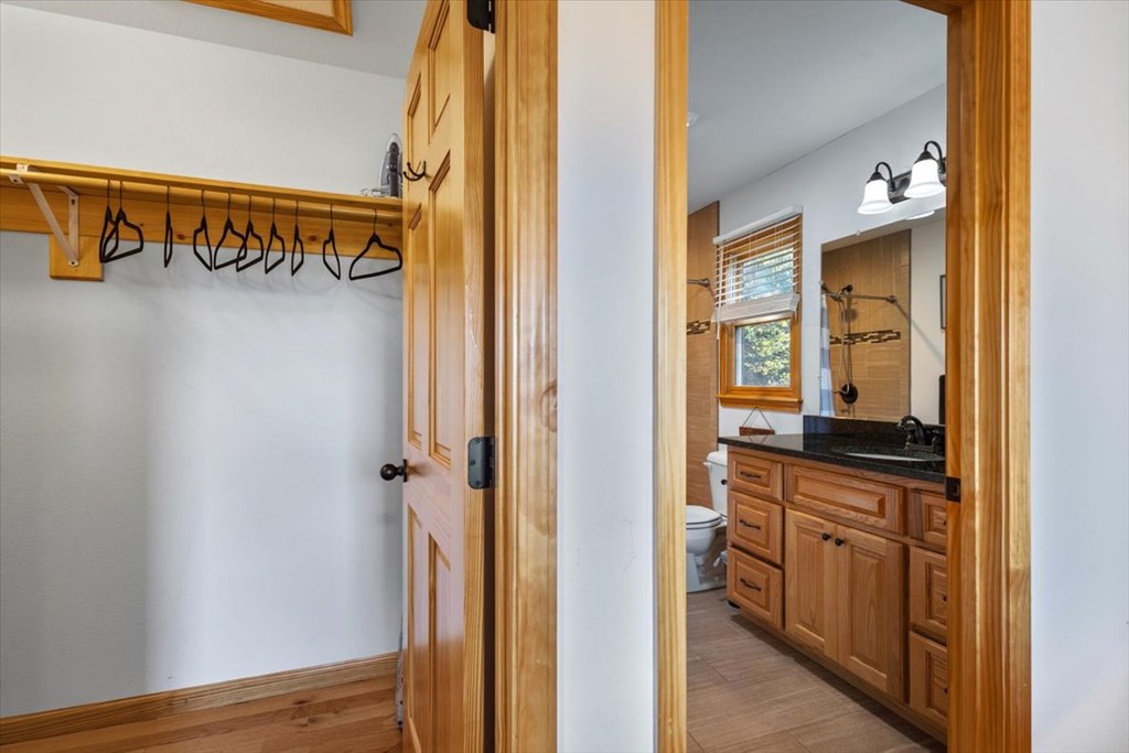 190 Regency Drive Murphy, NC 28906 - Photo 32 of 42 a view of a walk in closet and bathroom