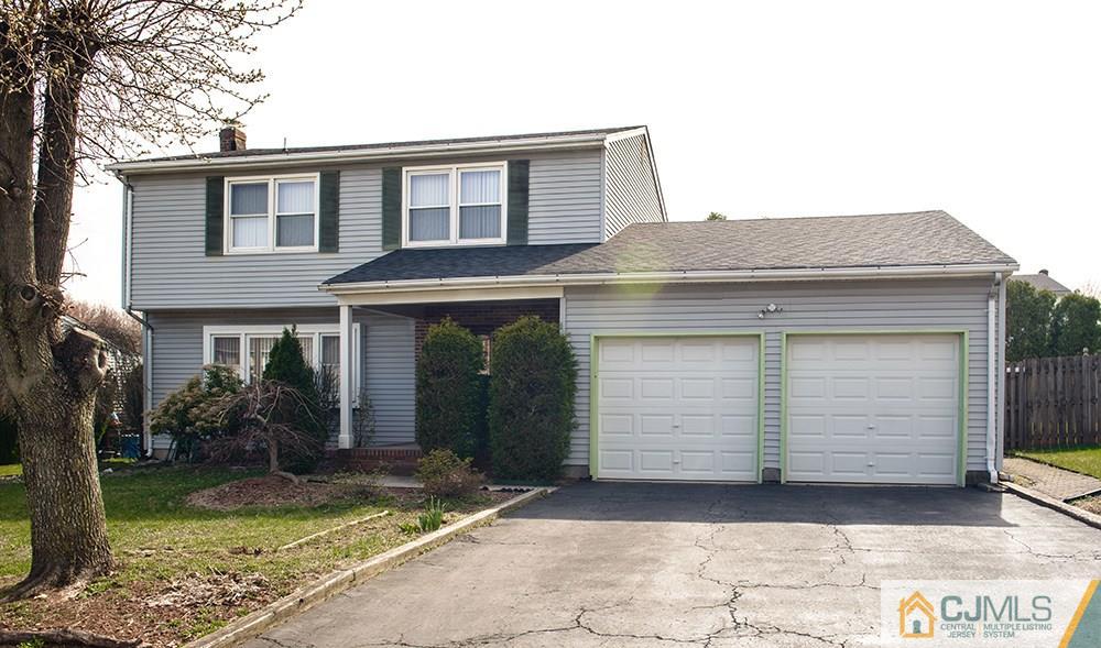 56 Brookside Road Edison, NJ 08817 - Photo 1 of 24 a front view of a house
