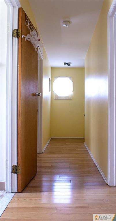 56 Brookside Road Edison, NJ 08817 - Photo 13 of 24 a view of entryway with wooden floor