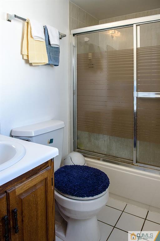 56 Brookside Road Edison, NJ 08817 - Photo 15 of 24 a bathroom with a sink toilet and shower