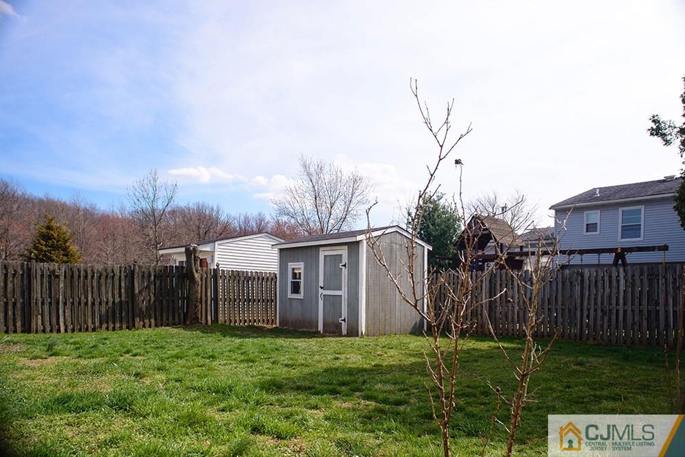 56 Brookside Road Edison, NJ 08817 - Photo 23 of 24 a house view with a garden space