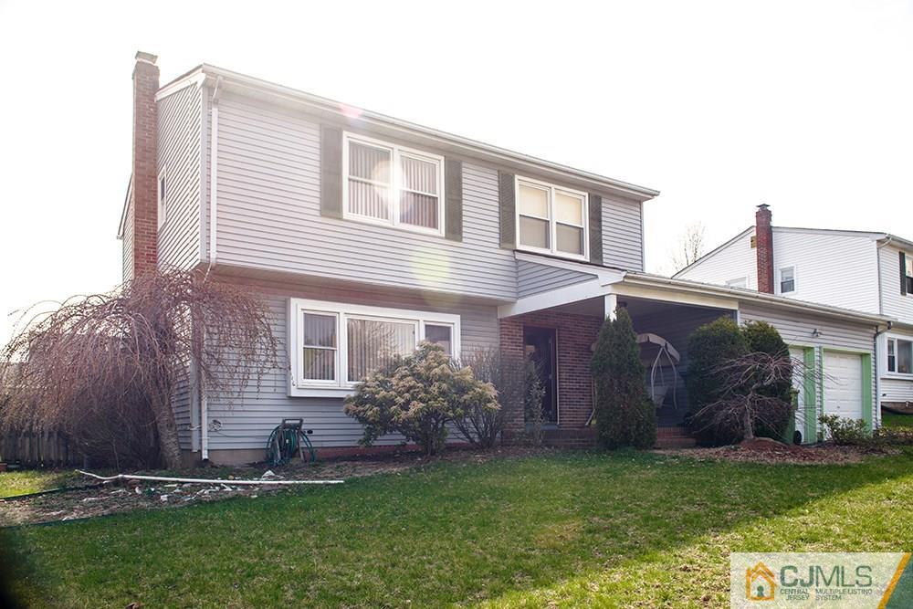 56 Brookside Road Edison, NJ 08817 - Photo 24 of 24 a house view with a garden space