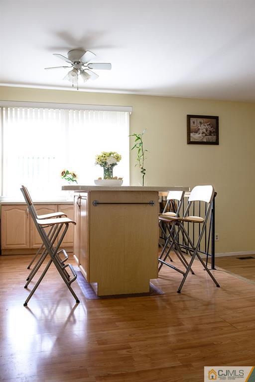 56 Brookside Road Edison, NJ 08817 - Photo 7 of 24 a workspace with wooden floor