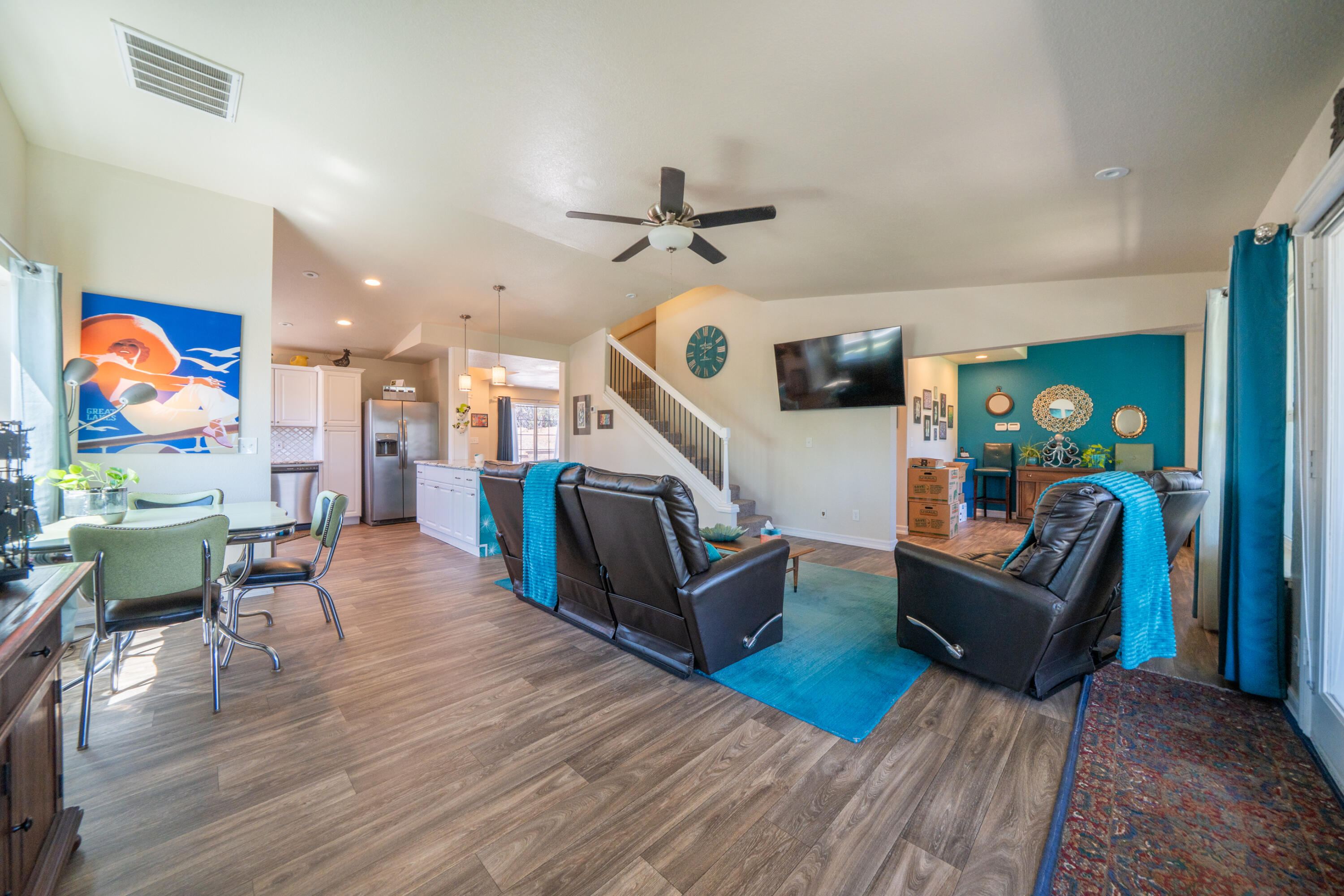 7954 Placer Road Redding, CA 96001 - Photo 13 of 97 a living room with furniture kitchen view and a wooden floor