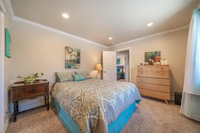 a view of a house with a yard and mountain view